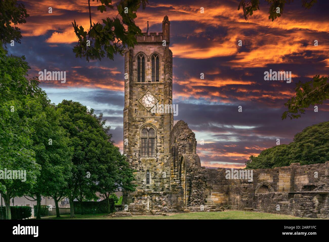 The ancient ruins of Kilwinning Abbey and the old Clock Tower that stands over the abbey. Stock Photo