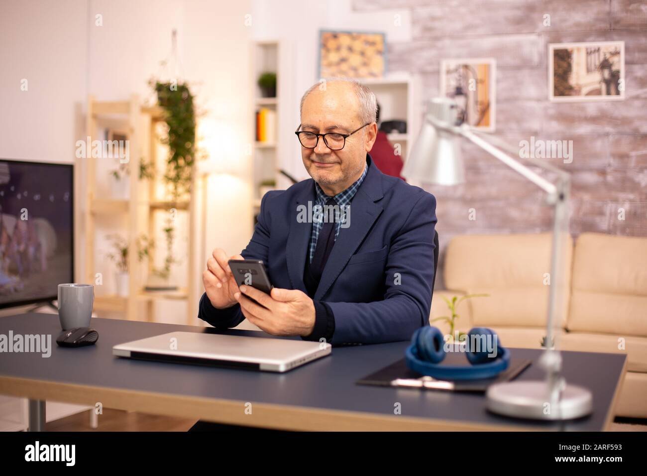 Old man using new hi-res stock photography and images - Alamy