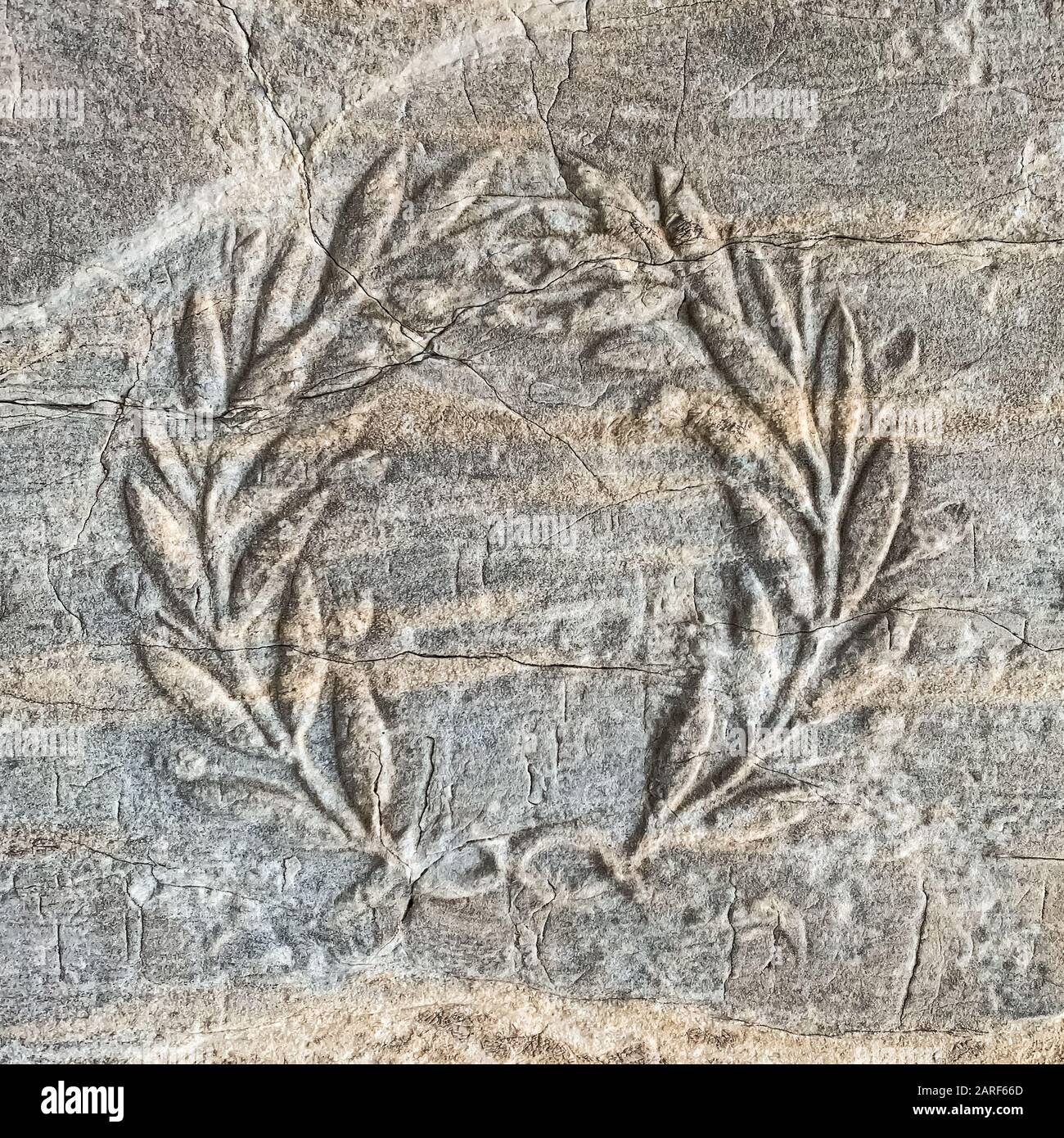 Ancient Greek myrtle wreath, relief on a stone of the Acropolis in