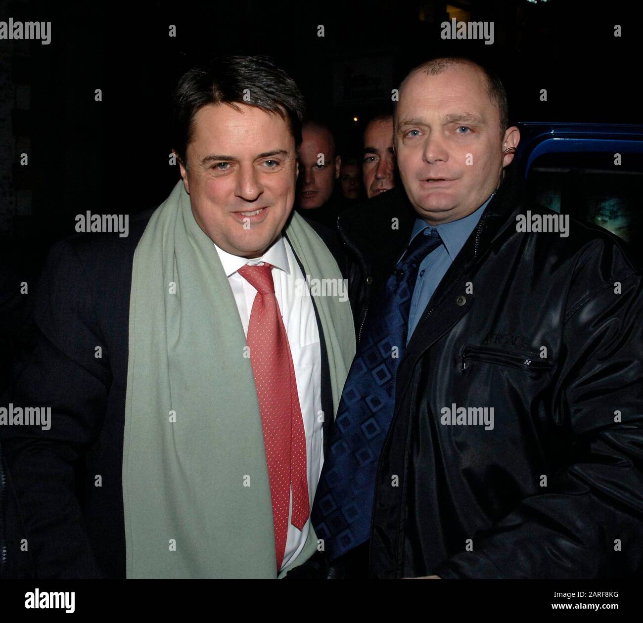 Controversial historian David Irving and BNP leader Nick Griffin  pass by demonstrators whilst attending as guest speakers the Oxford Union debating society meeting in 2007. Stock Photo