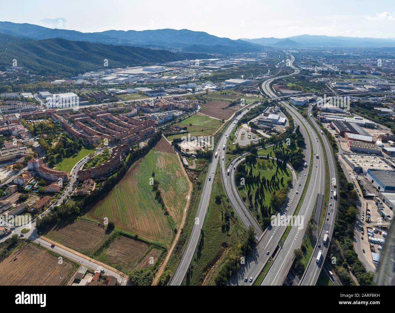 Aerial view of AP-7 highway and industrial area. Montmelós. Barcelona, Spain. Stock Photo