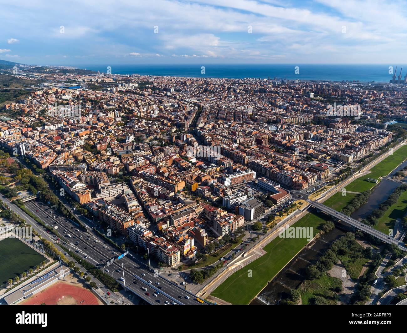 Aerial view of Besòs river and Santa Coloima de Gramenet. Barcelona, Spain. Stock Photo