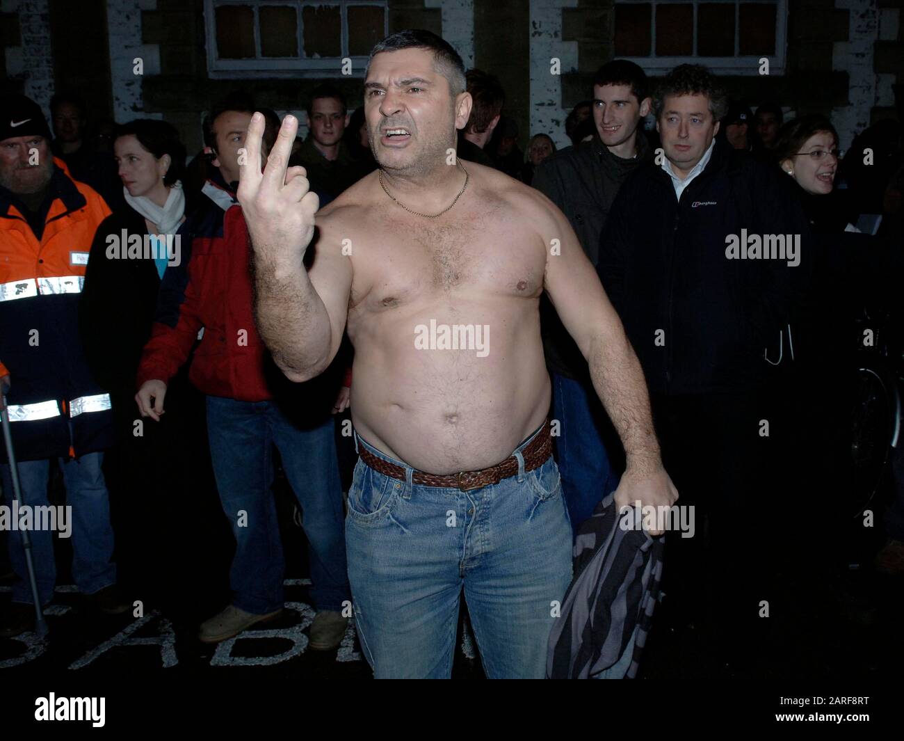 Controversial historian David Irving and BNP leader Nick Griffin  pass by demonstrators whilst attending as guest speakers the Oxford Union debating society meeting in 2007. Stock Photo