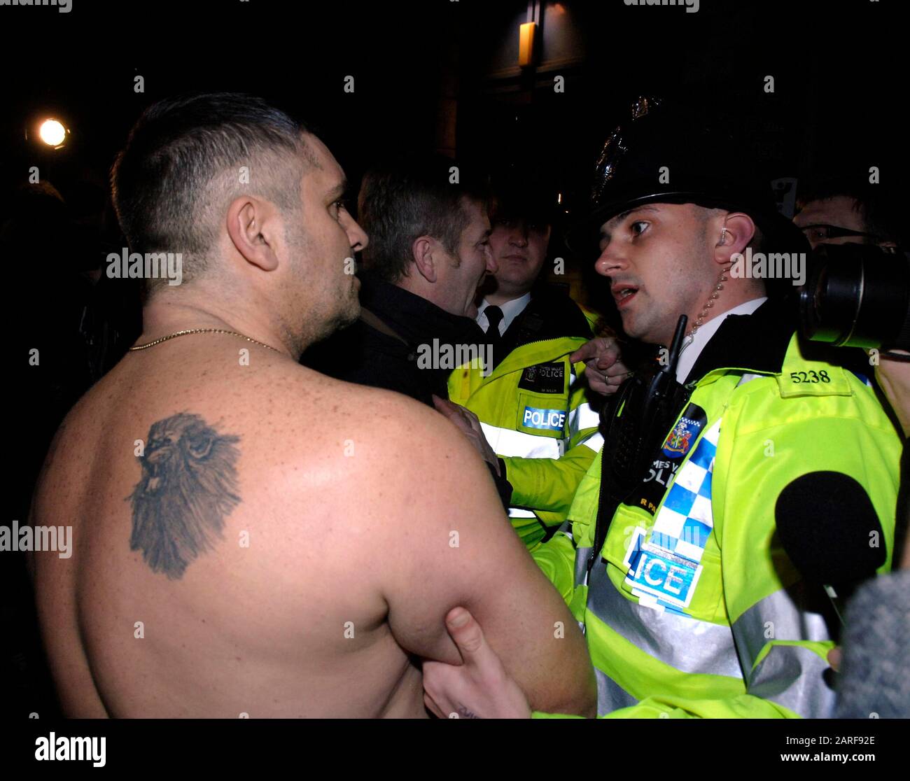 Controversial historian David Irving and BNP leader Nick Griffin  pass by demonstrators whilst attending as guest speakers the Oxford Union debating society meeting in 2007. Stock Photo