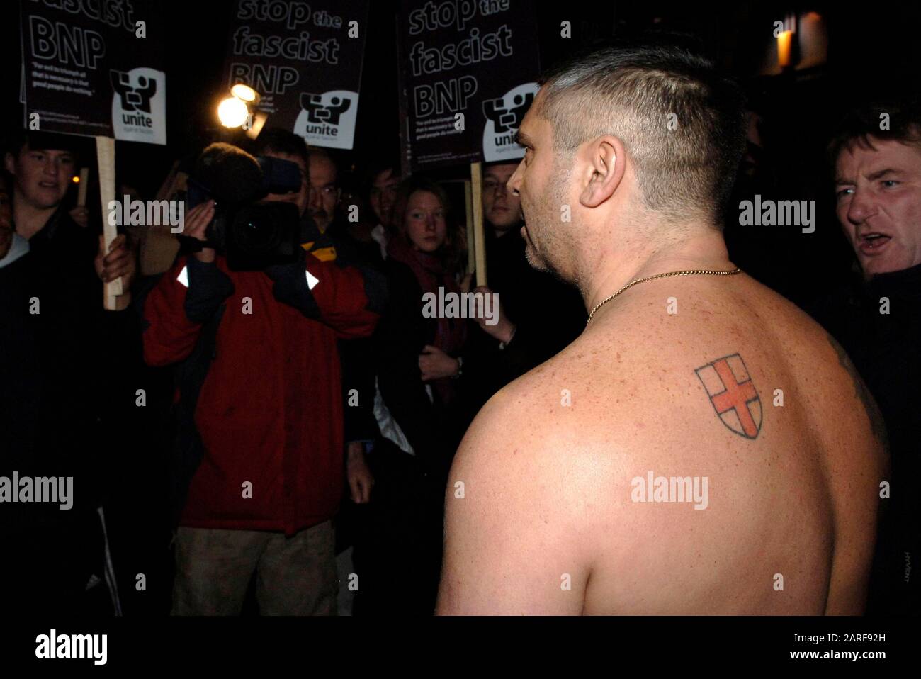 Controversial historian David Irving and BNP leader Nick Griffin  pass by demonstrators whilst attending as guest speakers the Oxford Union debating society meeting in 2007. Stock Photo