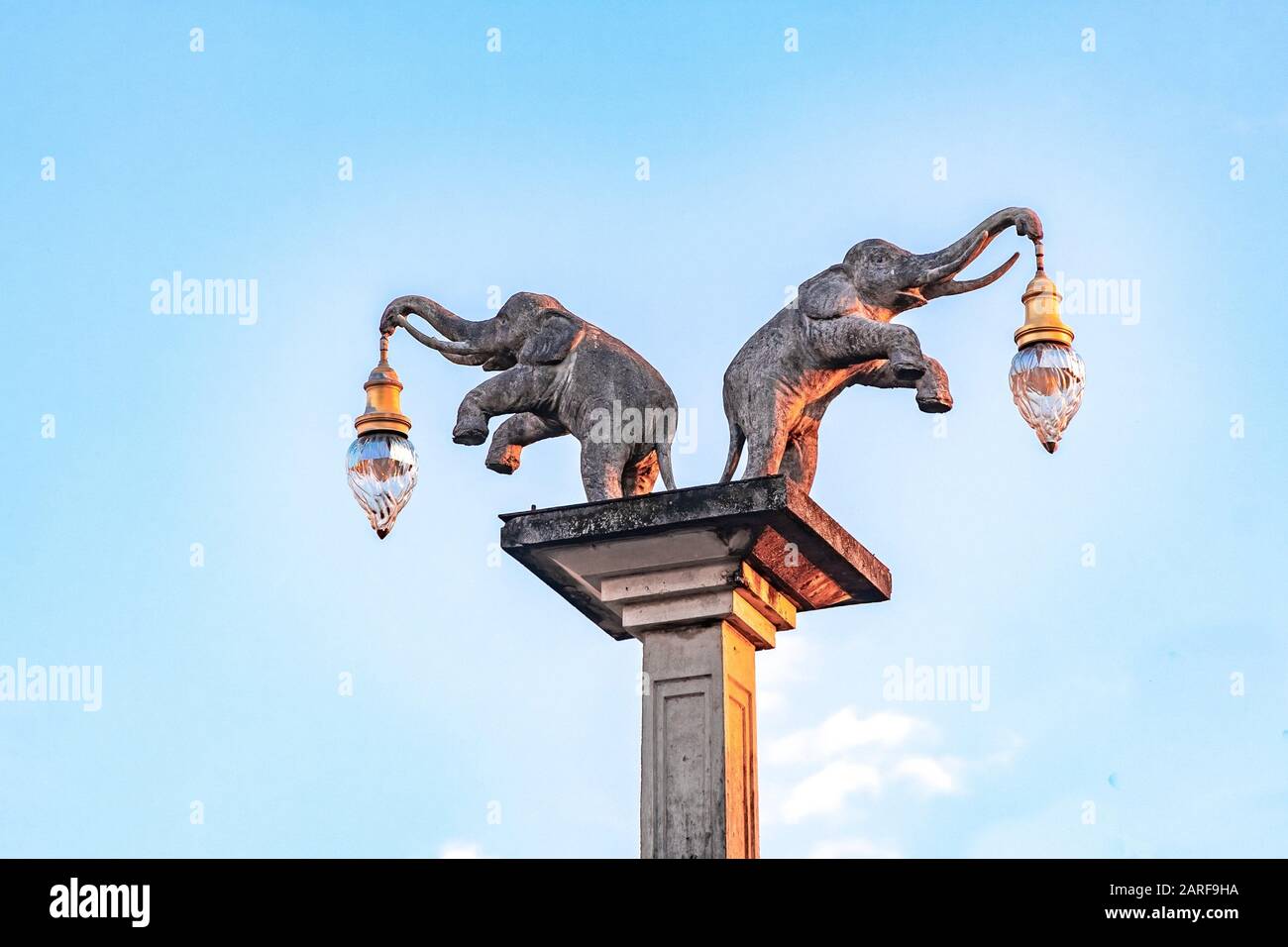 Close-up Elephant sculpture holding street light by its trunk in Krabi Town, Thailand. Stock Photo