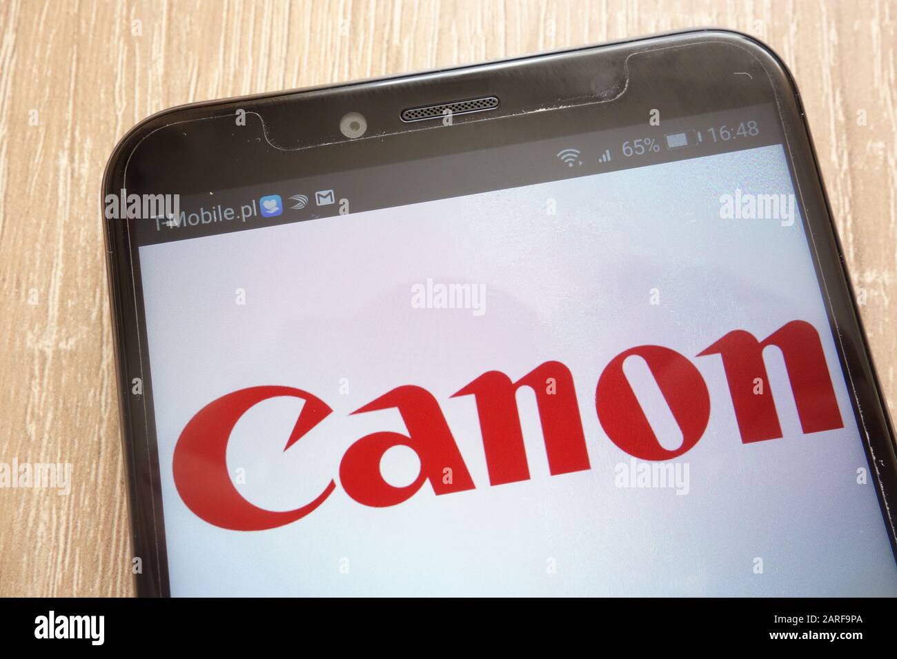 Canon logo displayed on a modern smartphone Stock Photo