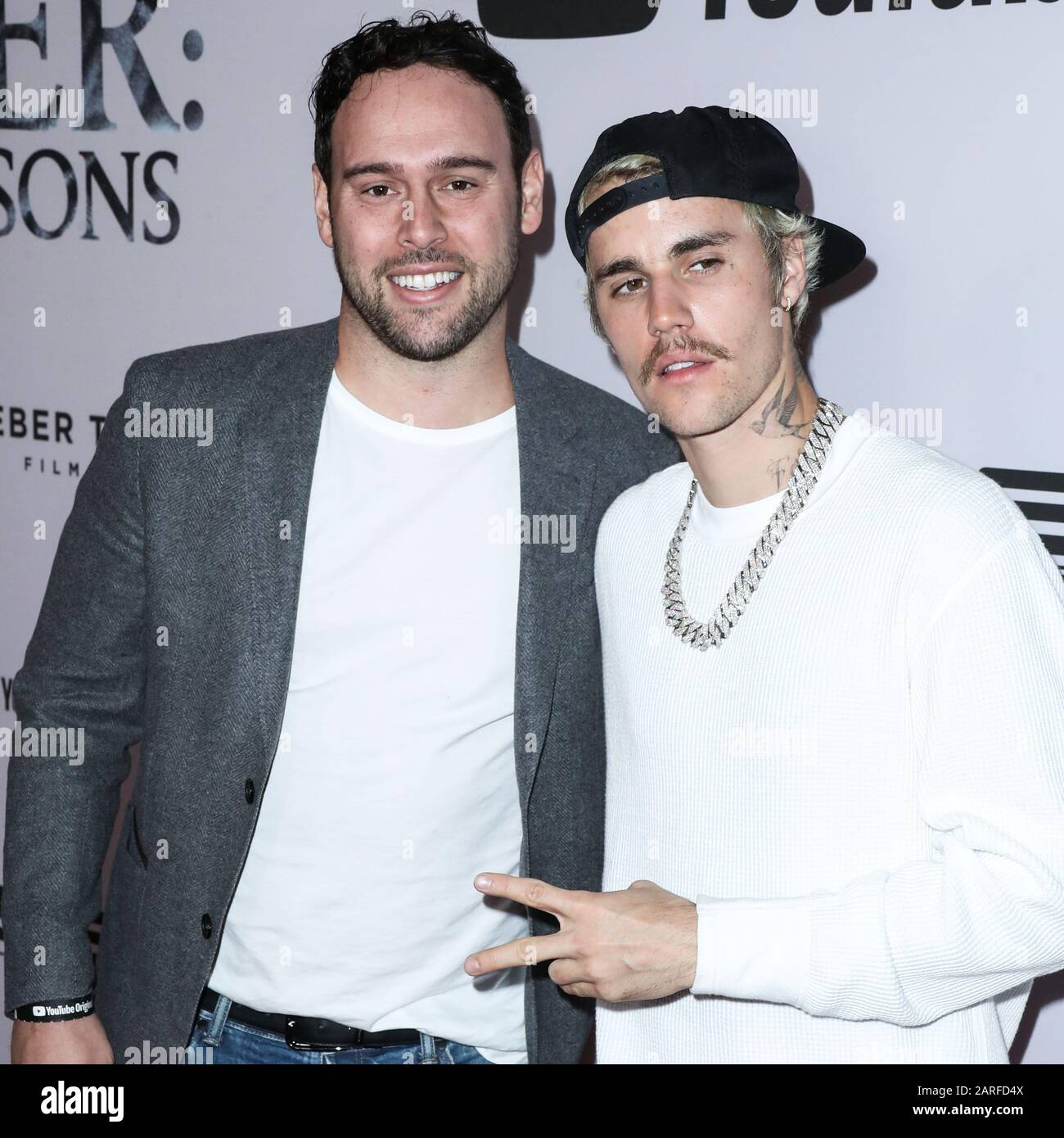 Justin Bieber and Scooter Braun arrive for the 2012 Tribeca Disruptive  Innovation Awards at Paulson Auditorium at NYU Stern School of Business in  New York on April 27, 2012. UPI /Laura Cavanaugh