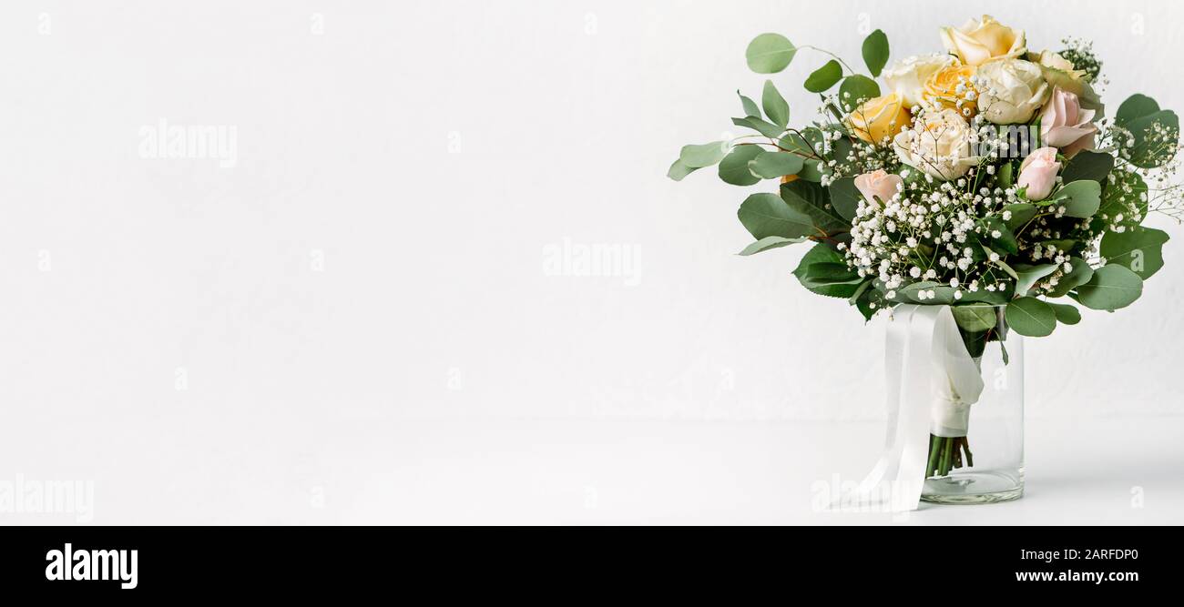 Flower composition, wedding bouquet with ribbon, boutonniere Stock Photo