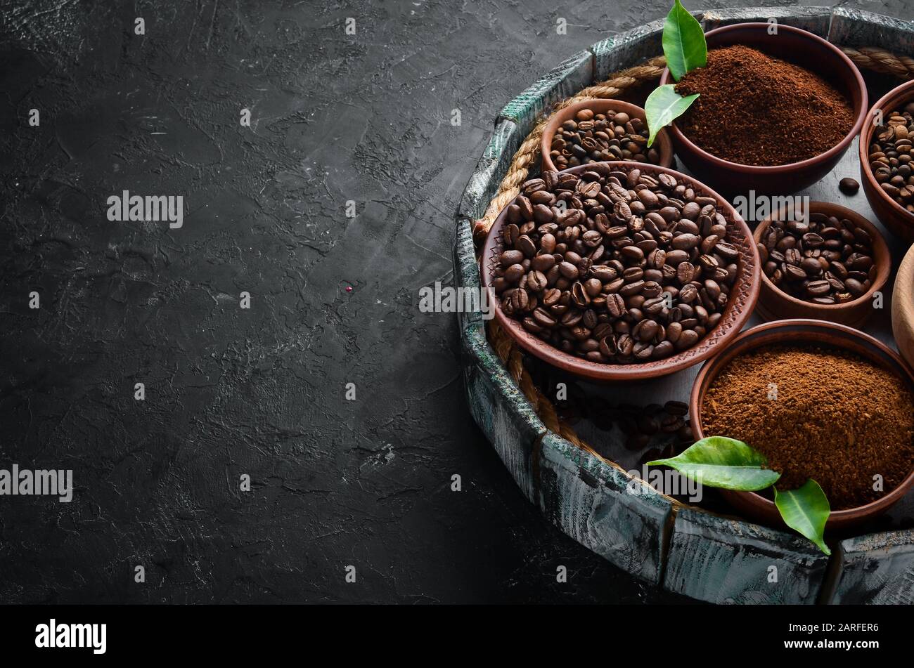 Ground coffee and coffee beans. Assortment of coffee varieties on a
