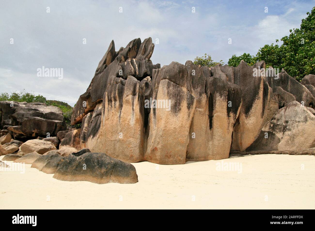 Rocky beach on Curieuse Island, Seychelles. Stock Photo