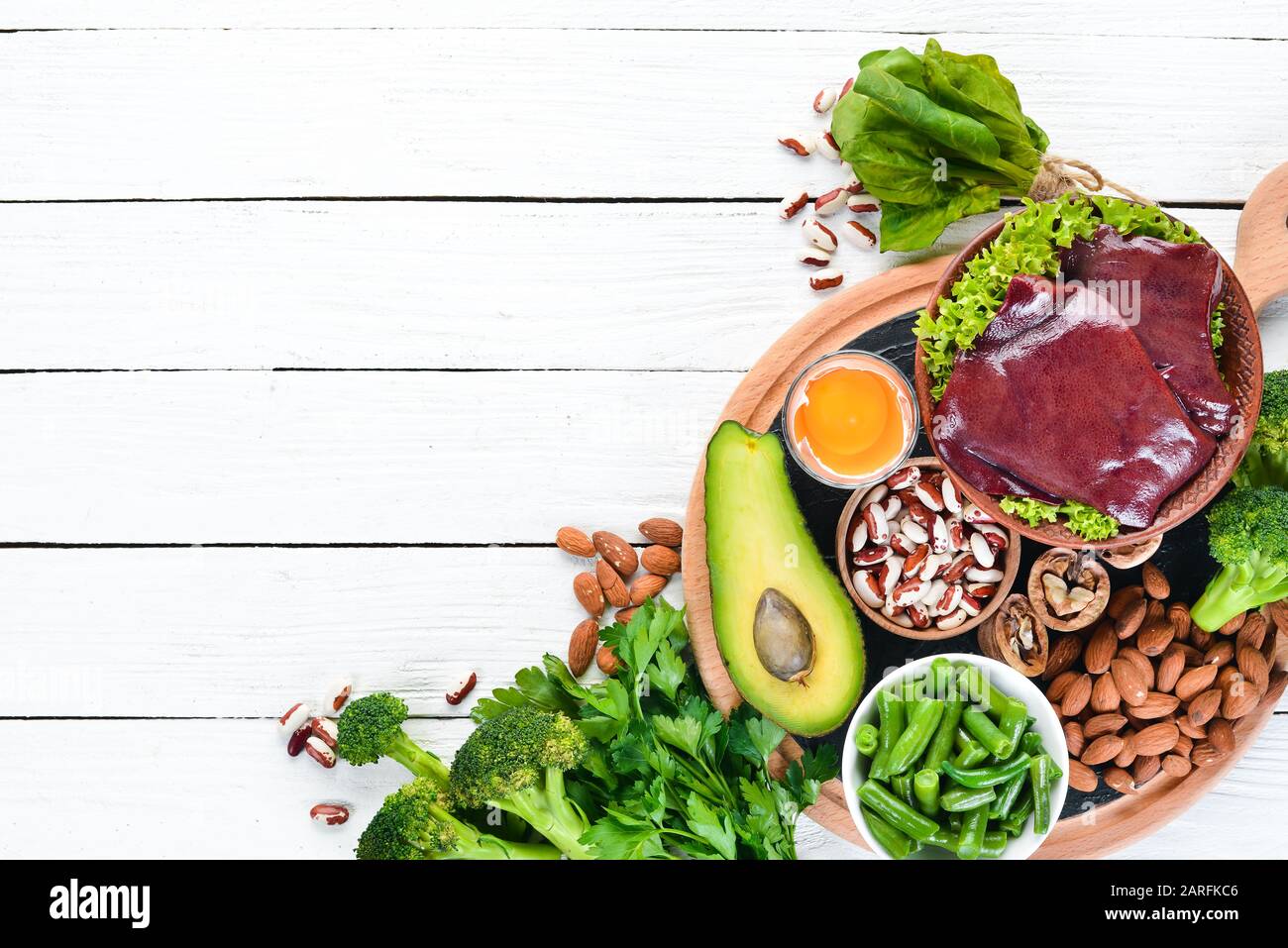 Food containing natural iron. Fe Liver, avocado, broccoli, spinach