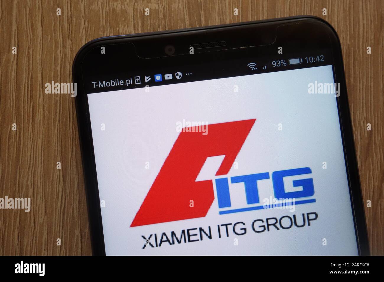 Xiamen ITG Holding Group logo displayed on a modern smartphone Stock Photo