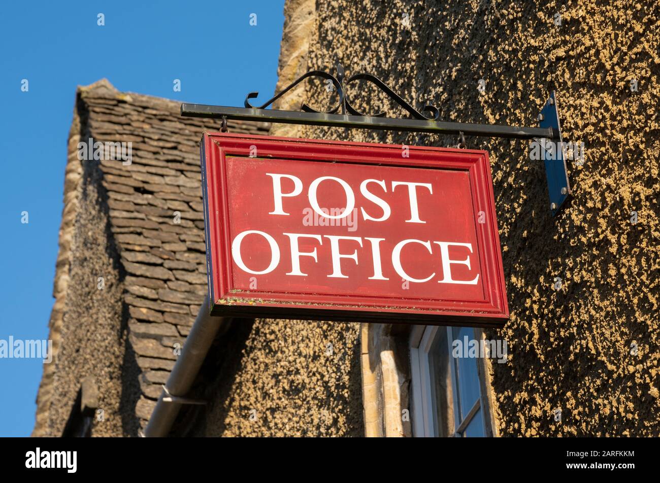 Post Office sign in rural location, England, United kingdom Stock Photo
