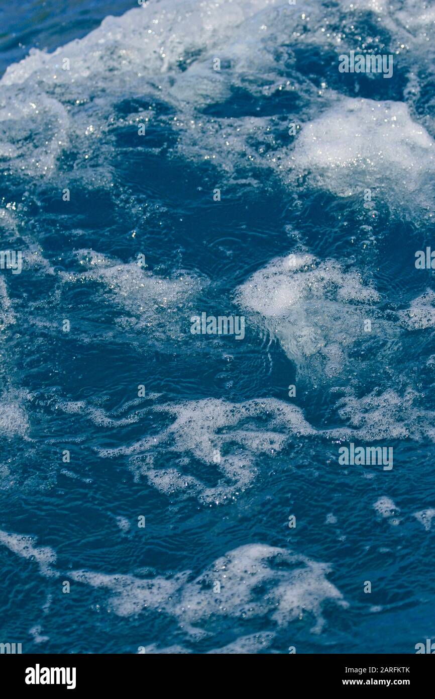 Sea water and foam, Seychelles. Stock Photo