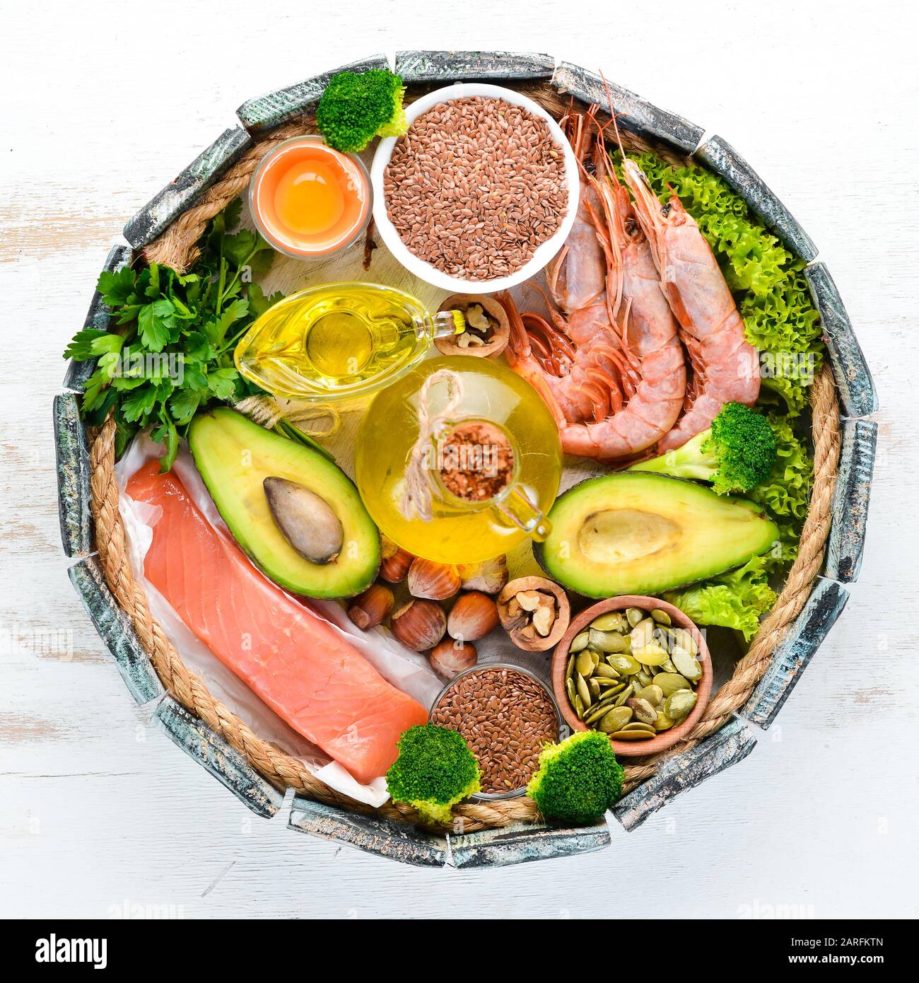 Balanced Keto diet. Healthy food avocado, fish, shrimp, broccoli, flax