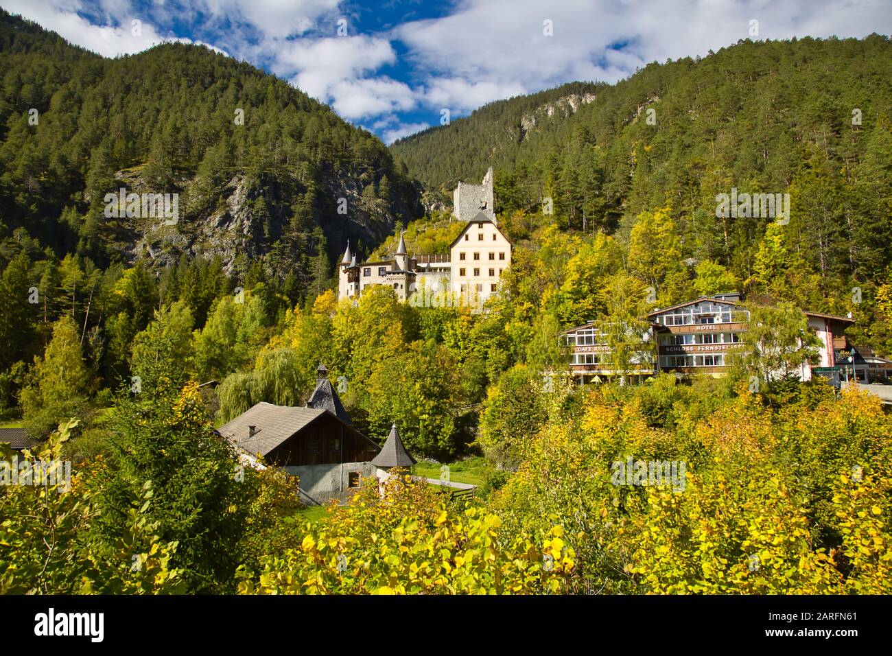 Fernsteinsee Hotel Schloss Fernsteinsee amidst autumn foliage, Fernpass, Tyrol ...
