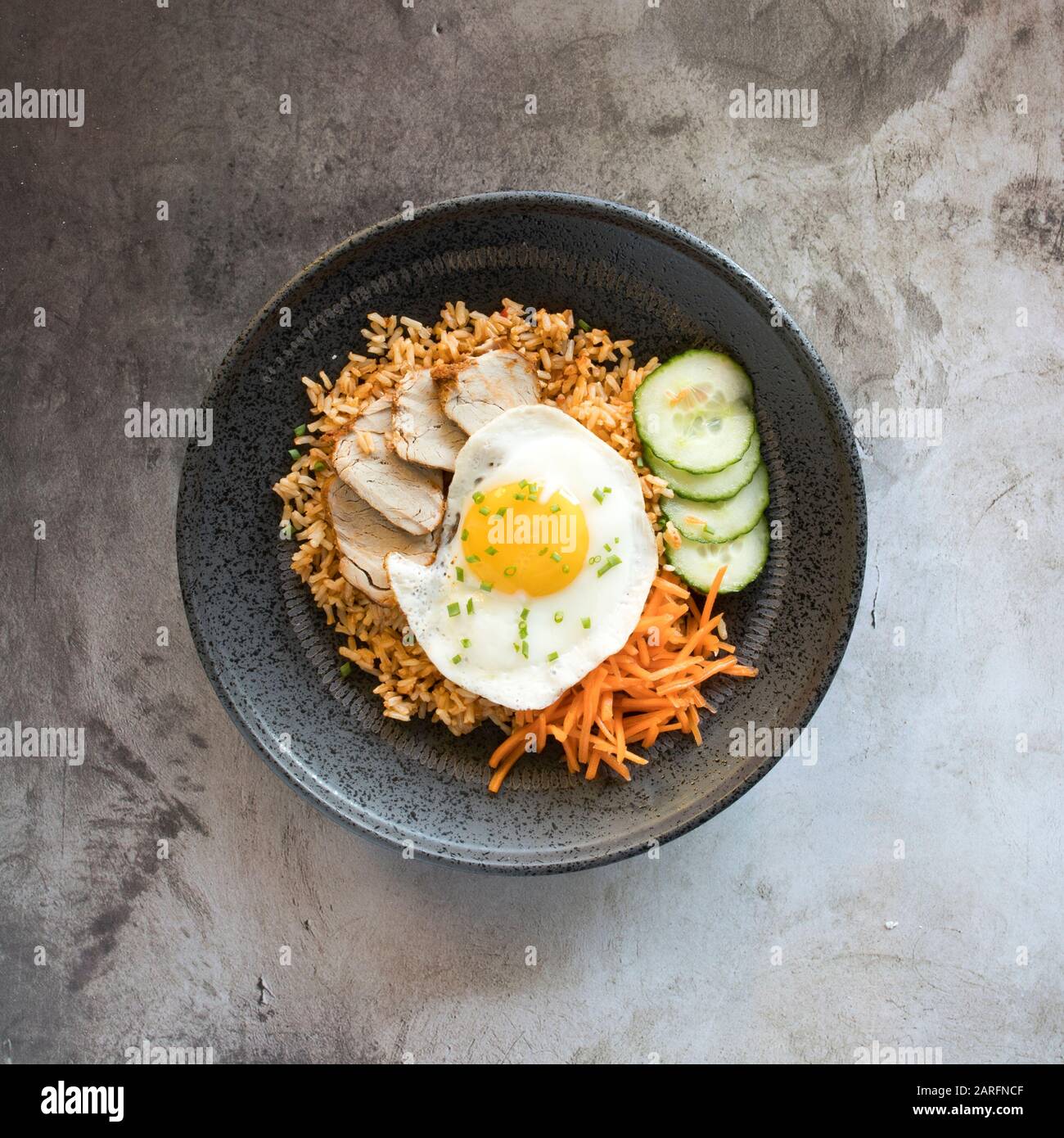 Kimchi Pork Rice Bowl with Pickled Vegetables Stock Photo