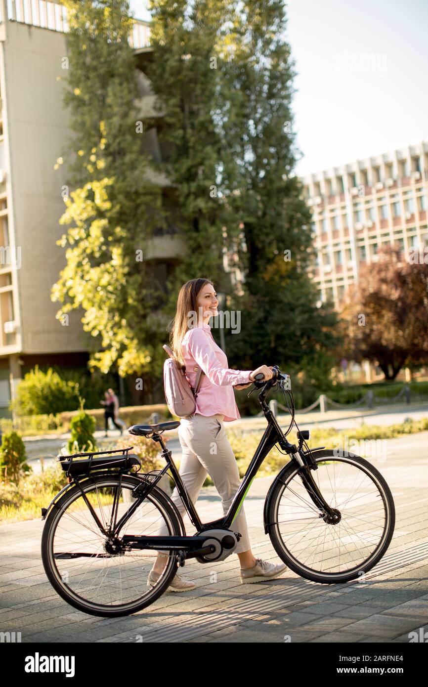 woman push bike