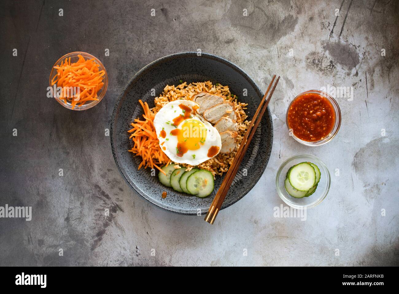 Kimchi Pork Rice Bowl with Pickled Vegetables Stock Photo