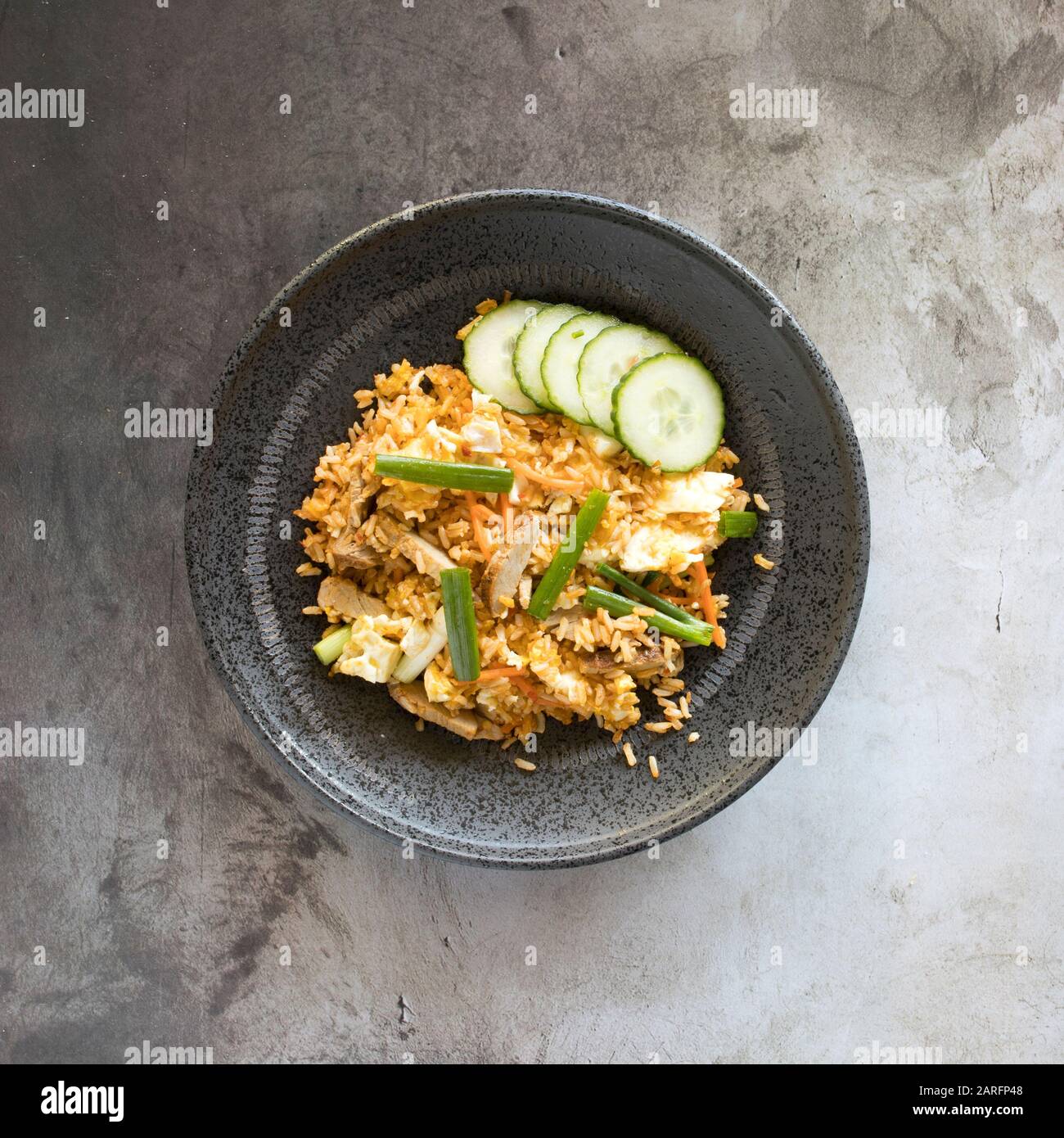Kimchi Pork Fried Rice with Pickled Vegetables Stock Photo