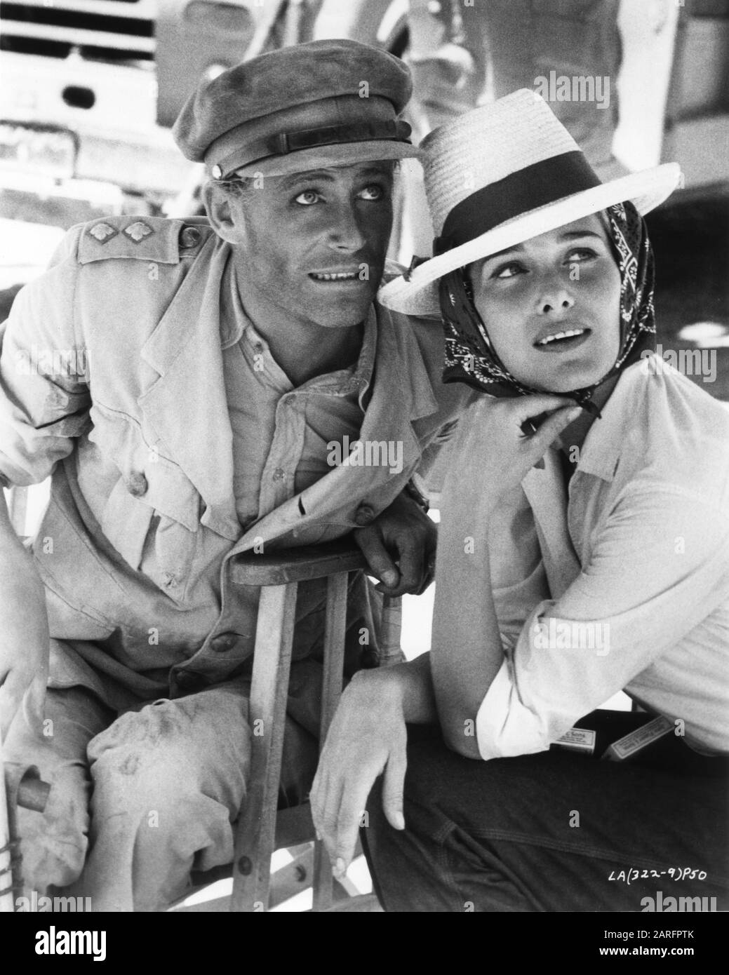 PETER O'TOOLE in costume as T.E. Lawrence and his wife SIAN PHILLIPS on set location candid during filming of LAWRENCE OF ARABIA 1962 director DAVID LEAN screenplay ROBERT BOLT and  MICHAEL WILSON producer SAM SPIEGEL Horizon Pictures / Columbia Pictures Corporation Stock Photo