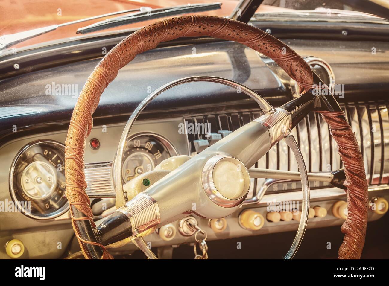 Retro styled image of the dashboard of a classic car Stock Photo Alamy