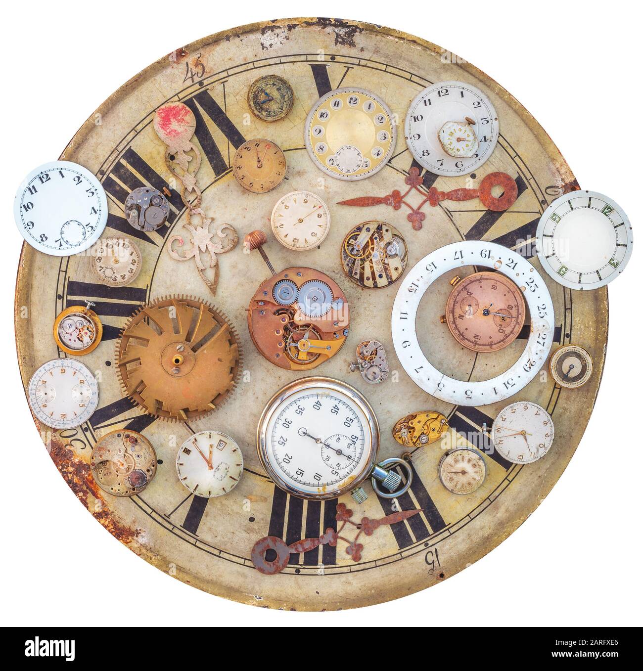Collection of vintage rusty watches and clock parts on an old clock face Stock Photo