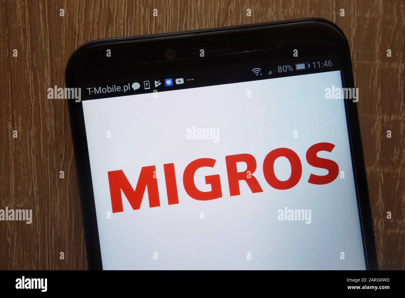 Migros logo displayed on a modern smartphone Stock Photo
