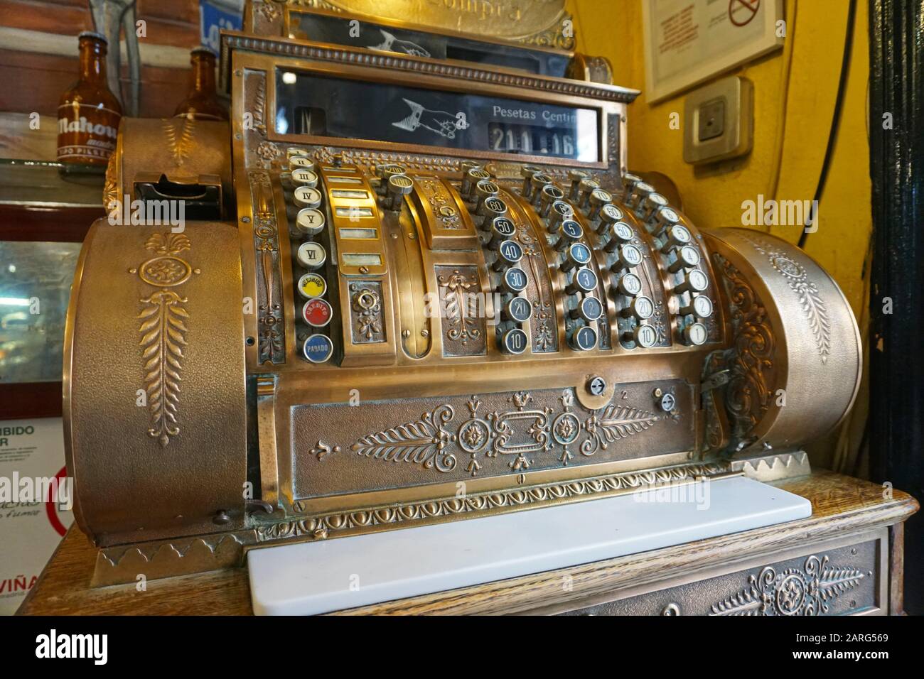 Old cash register National from early 20th century. In a tapas bar in Madrid, Spain, Europe