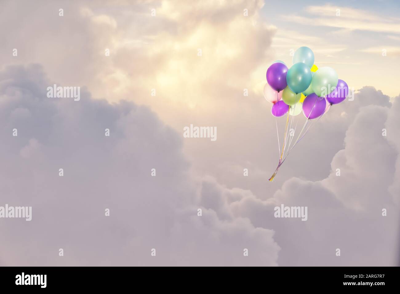 Bunch of colorful inflatable balloons flying high in the sky Stock ...