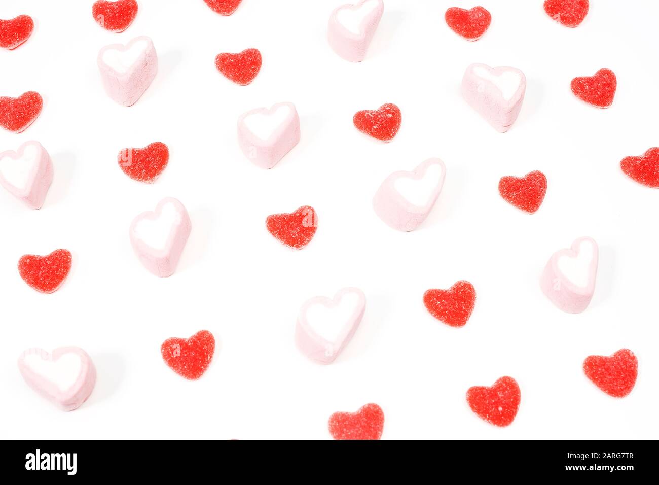 Heartshaped candy treats on a white background Stock Photo