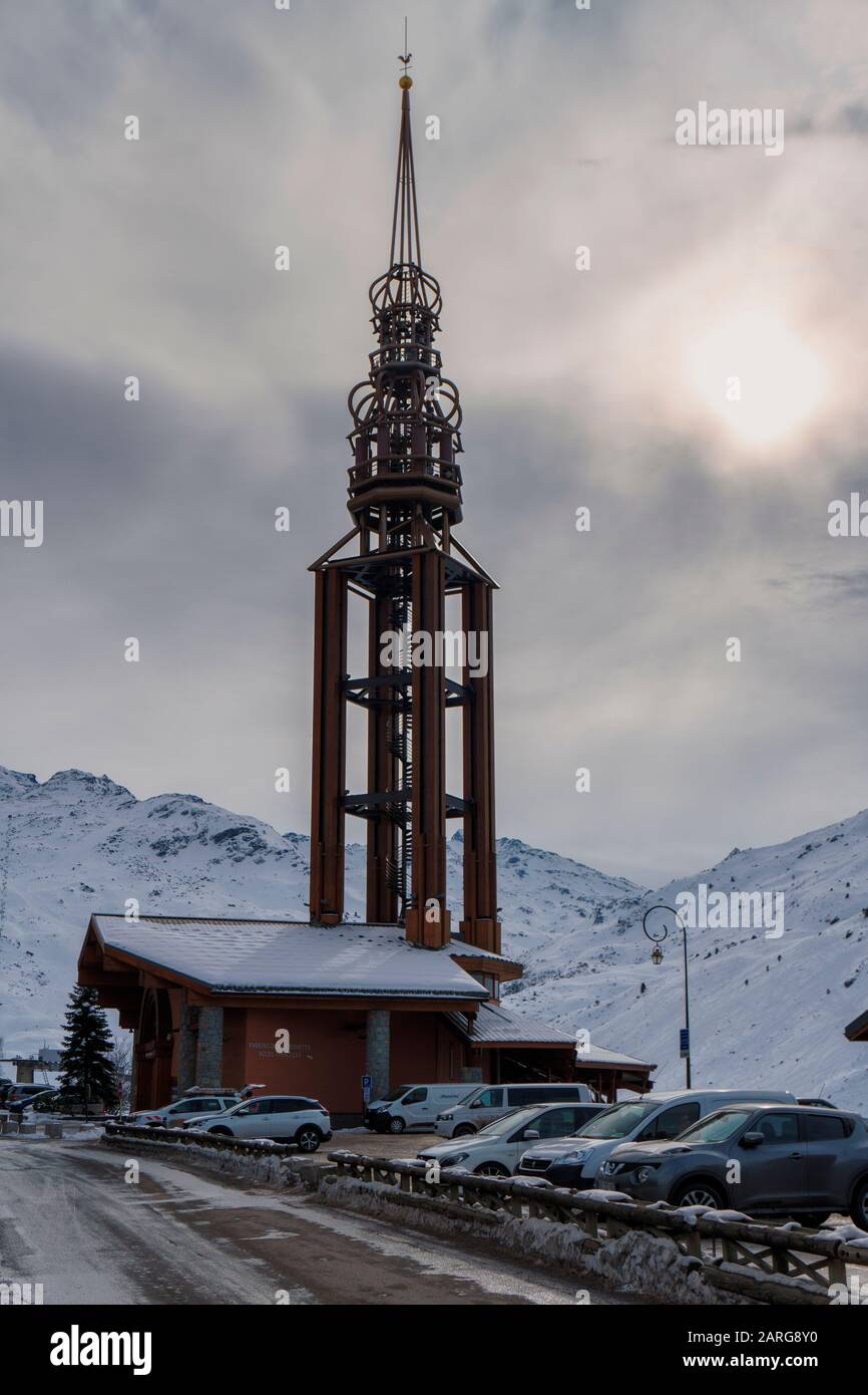 Espace Maurice Romanet church in the French ski Les Menuires, exterior showing the landmark modernist bell tower Stock Photo