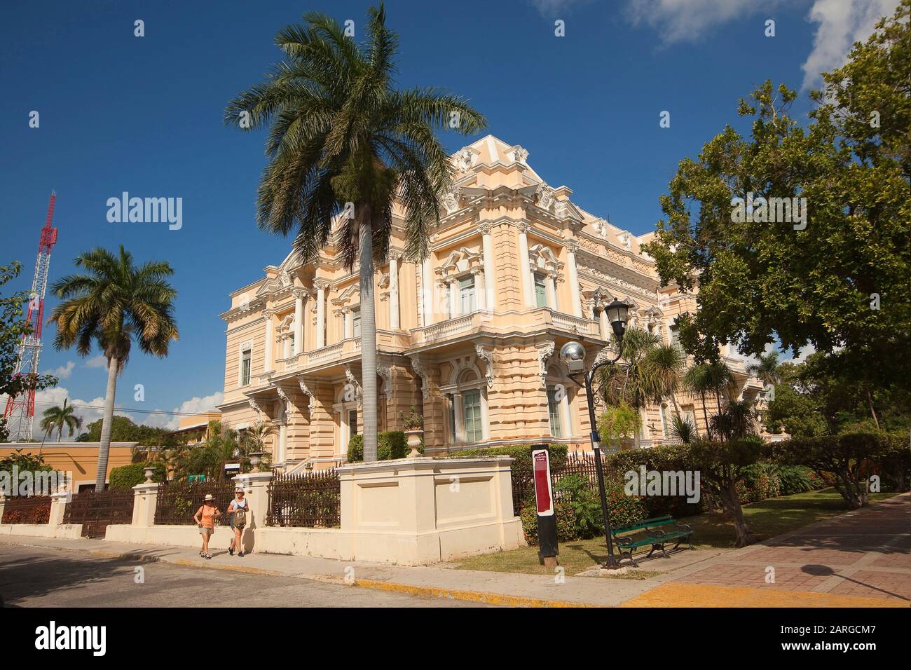 Tourists in front of the colonial building used as Museum of Anthropology at the city center, Merida, Yucatan Province, Mexico, Central America Stock Photo