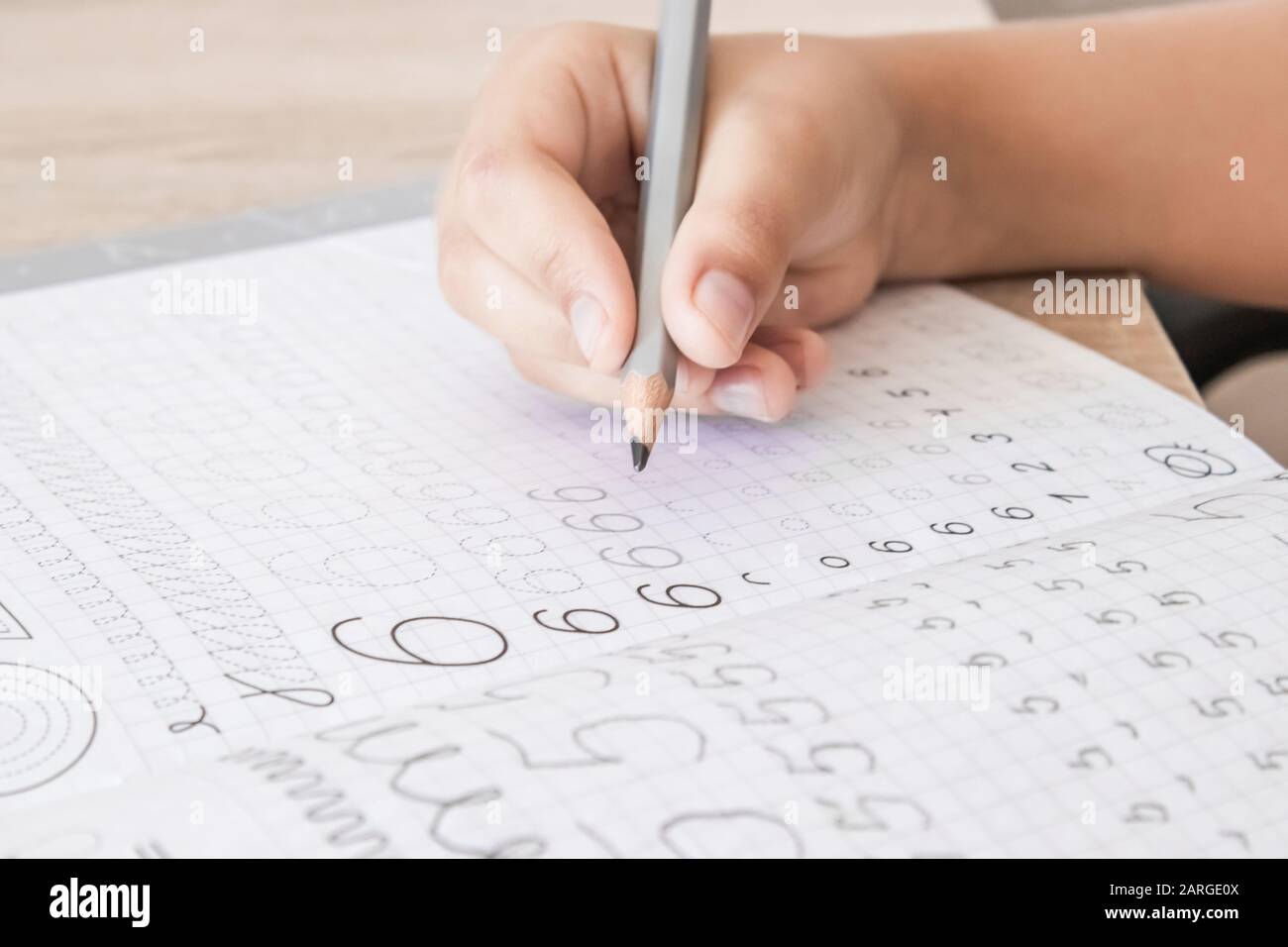 Child Write Number Child hand writing letters learning hi-res stock photography and images ...