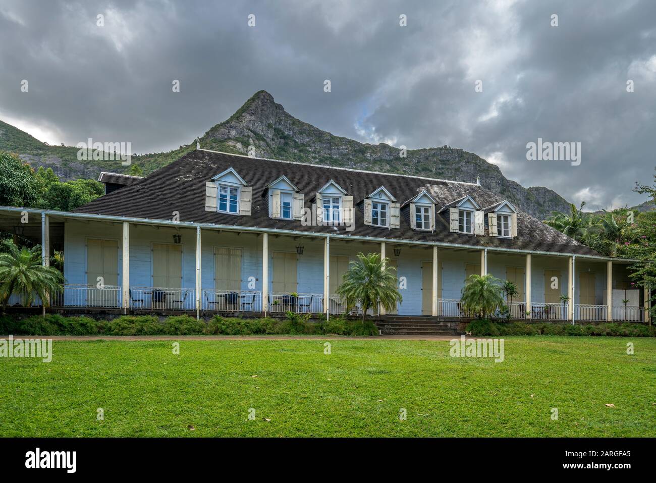 Clouds on mountains over Eureka La Maison Creole house and garden, Moka, Mauritius, Indian Ocean, Africa Stock Photo