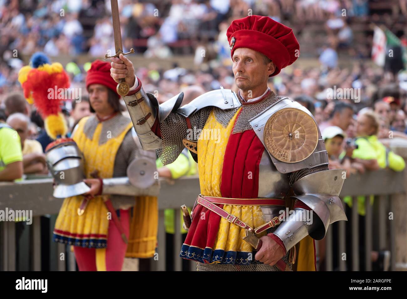 At the pageant that precedes the Palio race, representatives of each neighbourhood parade in traditional costume, Siena, Tuscany, Italy, Europe Stock Photo