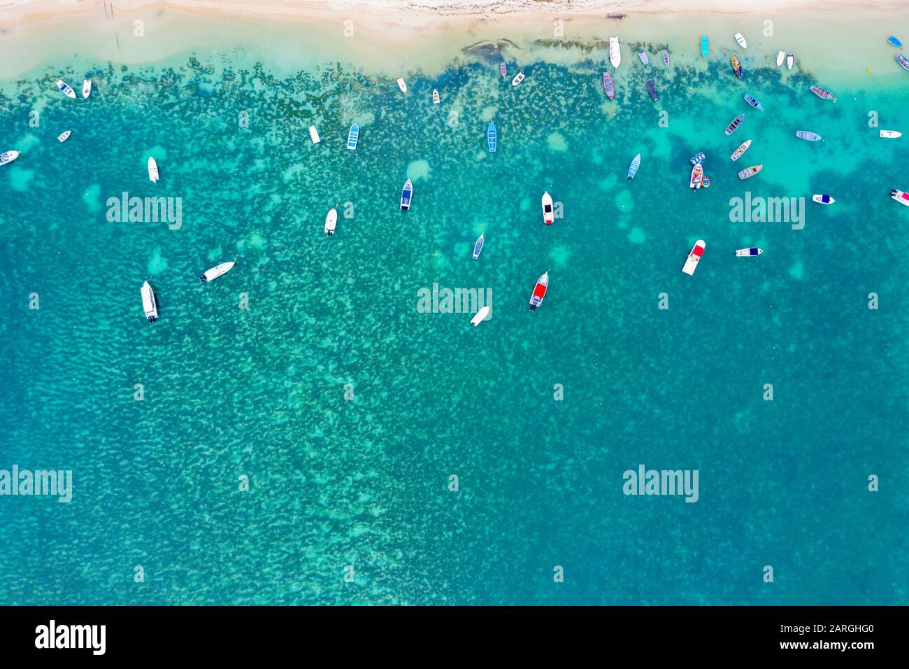 Aerial by drone of boats in the turquoise water of lagoon front of Mont Choisy beach, north-west coast, Mauritius, Indian Ocean, Africa Stock Photo
