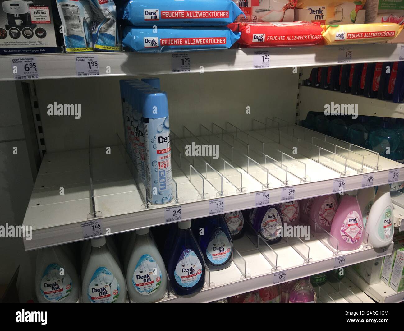 MUNICH, GERMANY – Jan 28, 2020: Nearly empty disinfection spray shelf in DM-drugstore after the first German 2019-nCoV Wuhan coronavirus case Stock Photo
