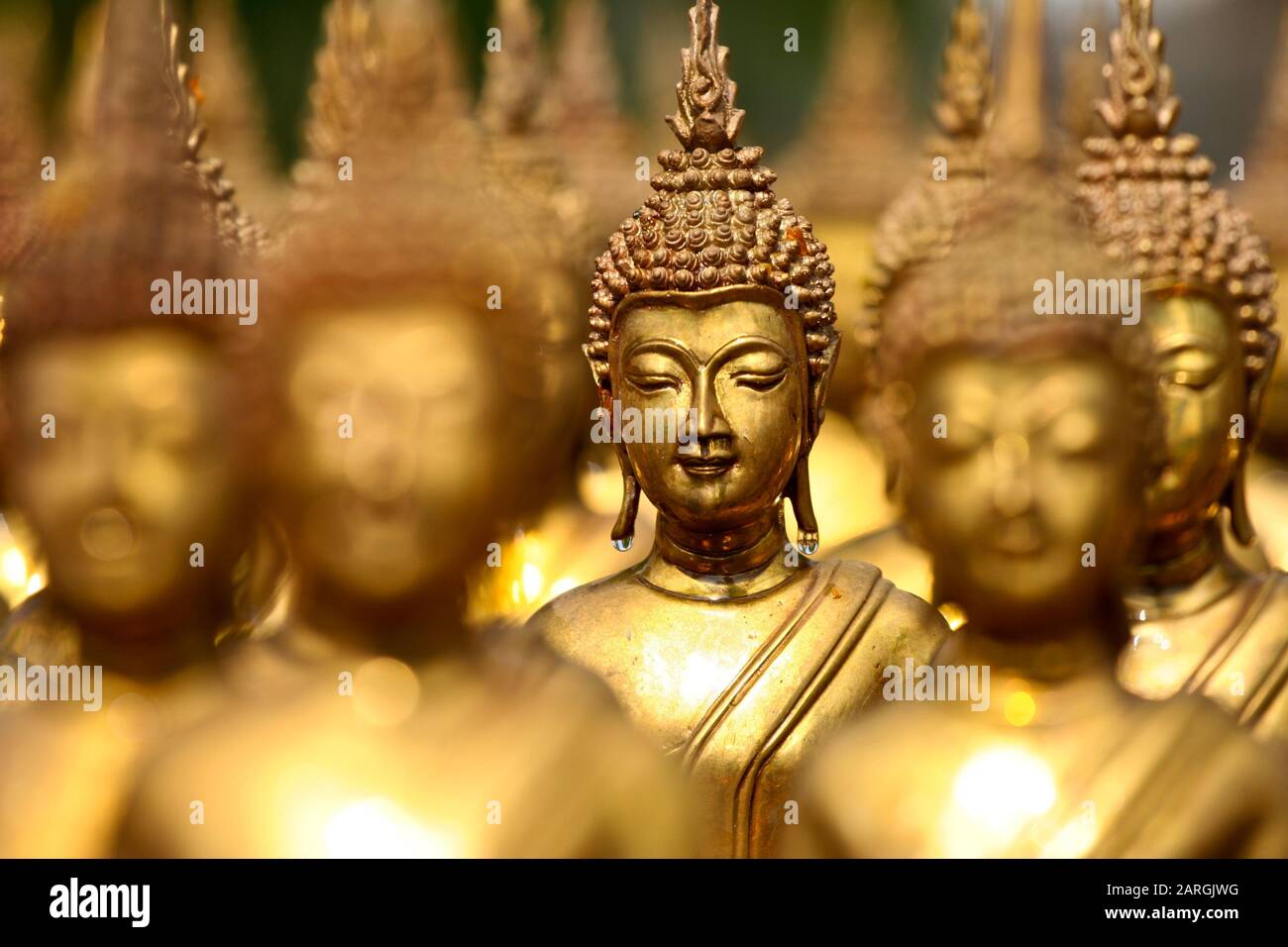 Face of gold buddha, Thailand Stock Photo - Alamy