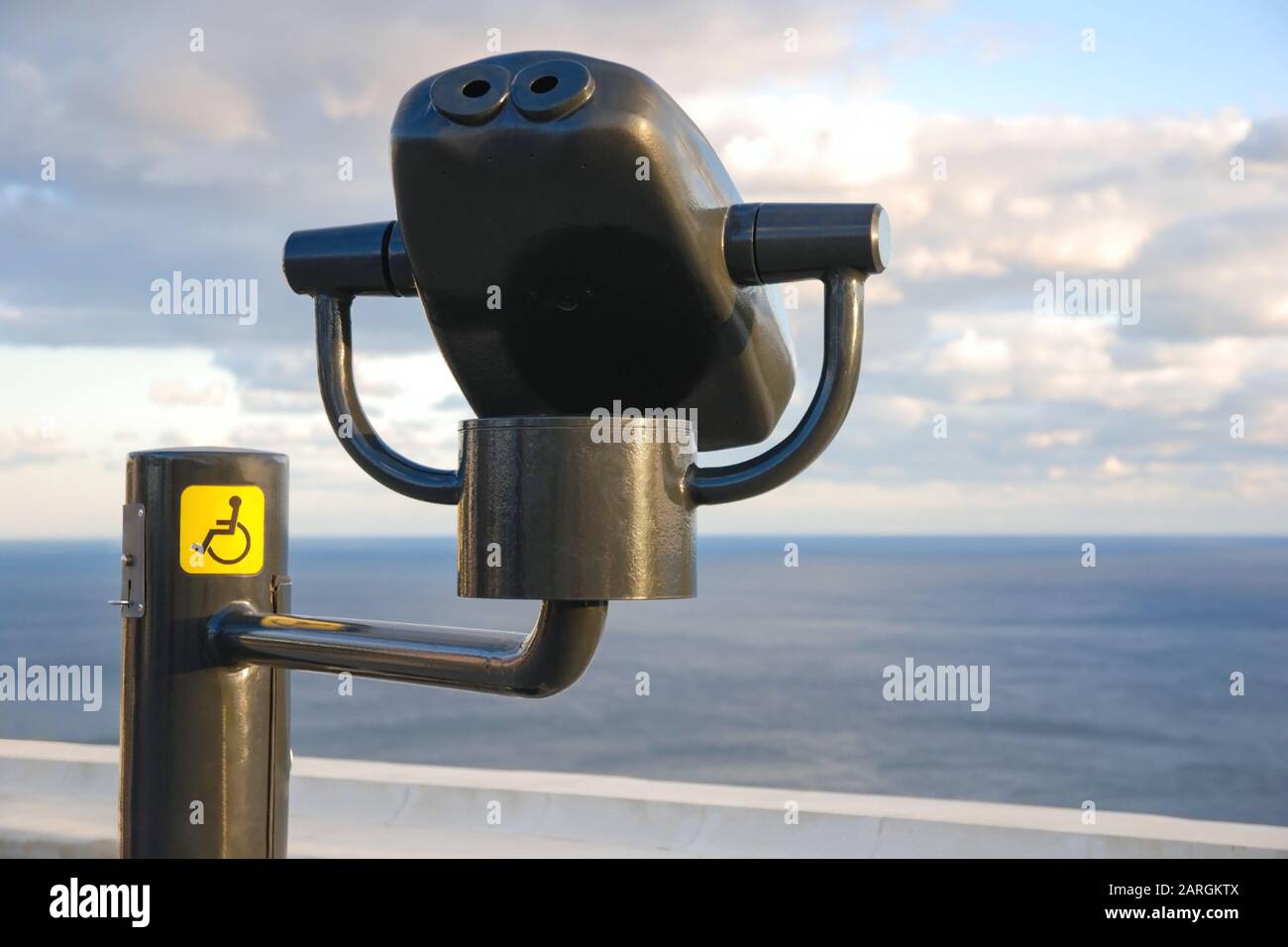 Binocular viewer for disabled tourists. Accessibility, lifestyle and inclusiveness concept. Stock Photo