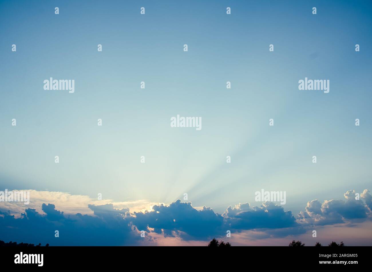 Sunset / sunrise with clouds, light rays and other atmospheric effect ...