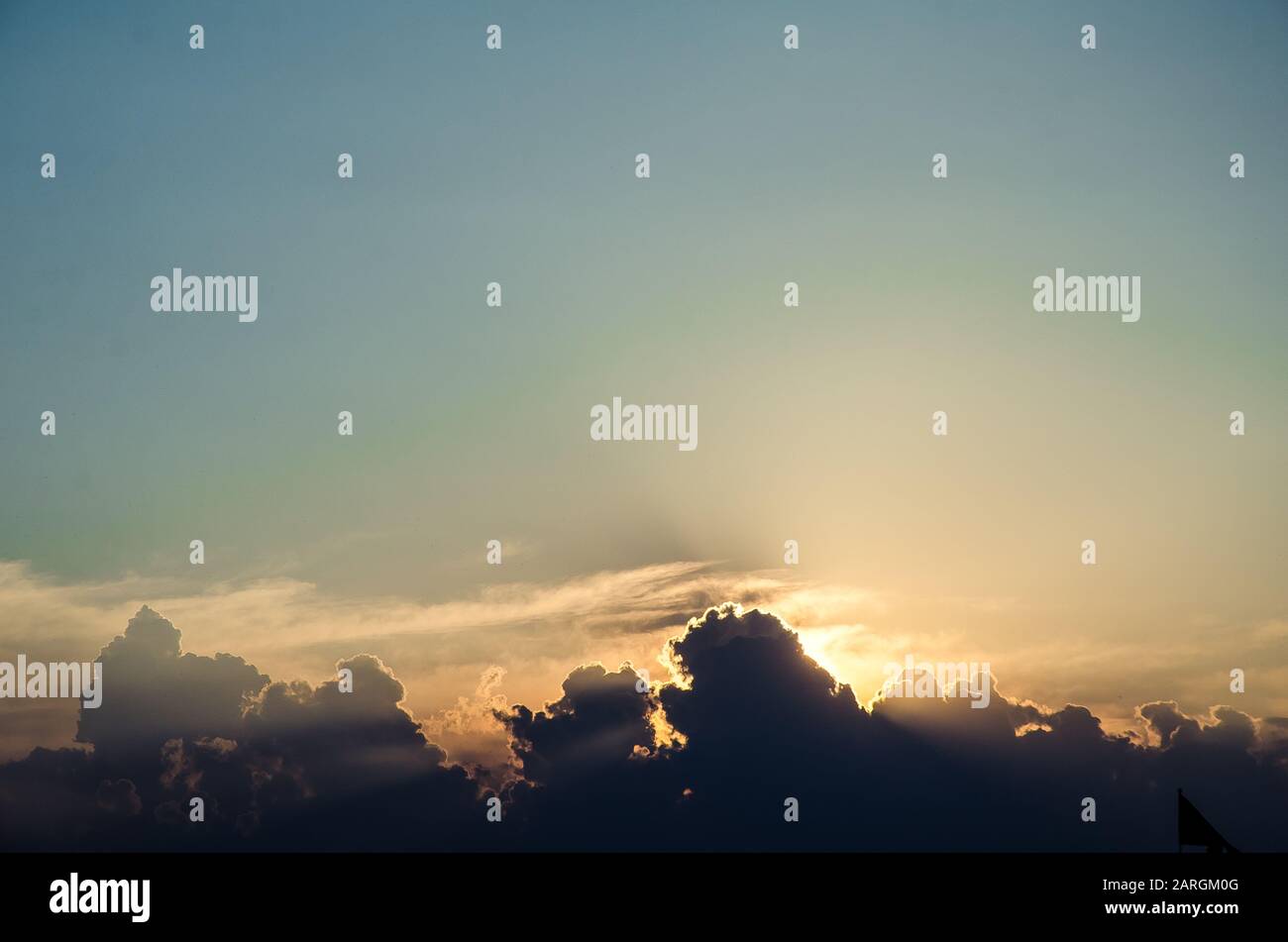 Sunset / sunrise with clouds, light rays and other atmospheric effect ...
