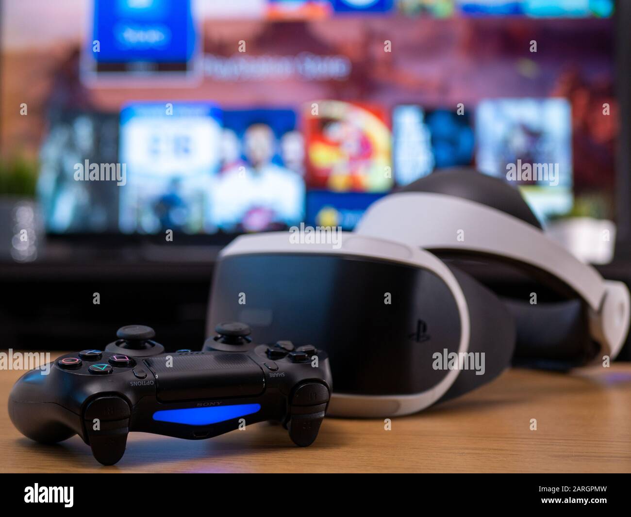 UK, Jan 2020: Virtual reality VR Sony headset for Playstation with  Dualshock remote controller in home setting Stock Photo - Alamy