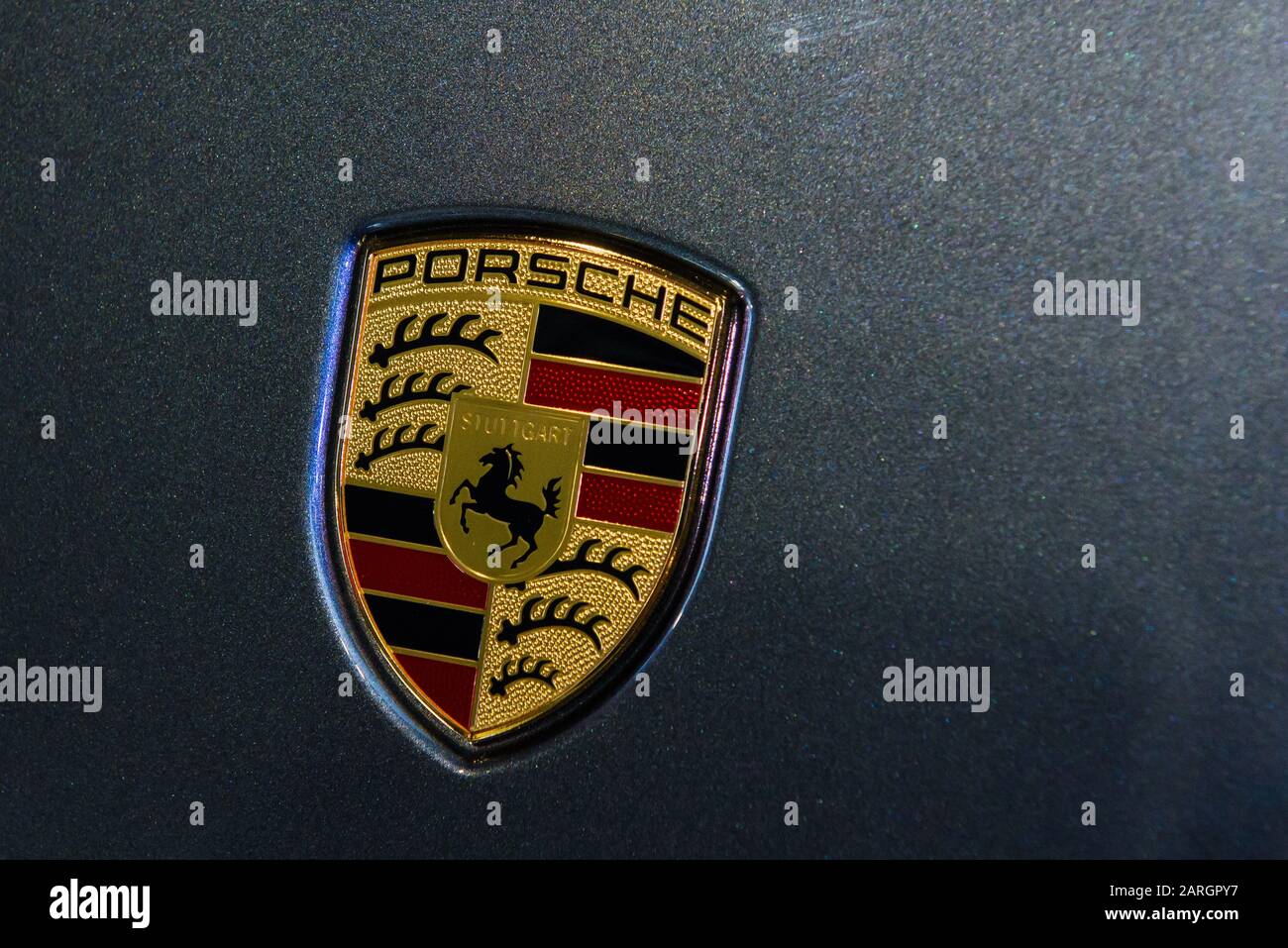 RIGA, LATVIA. 22nd January 2020. Porsche company logo on Porsche car. Porsche is a German automobile manufacturer specializing in high-performance sports cars, SUVs and sedans. Stock Photo