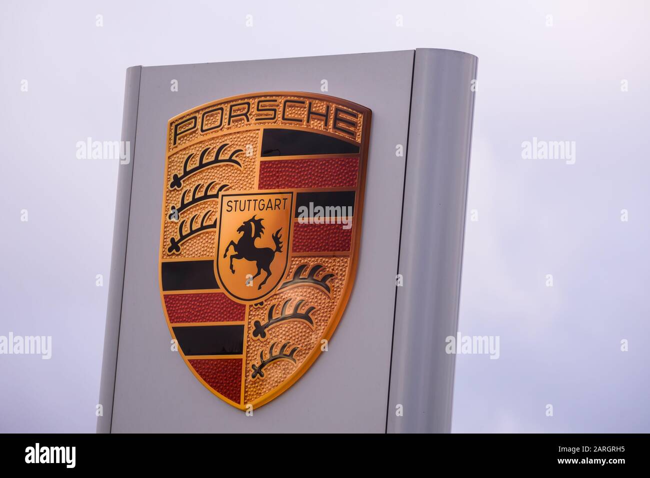 RIGA, LATVIA. 22nd January 2020. Porsche company logo on Porsche centre Riga. Porsche is a German automobile manufacturer specializing in high-performance sports cars, SUVs and sedans. Stock Photo