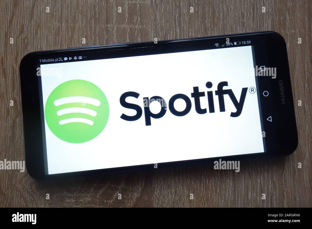 Spotify logo displayed on a modern Huawei smartphone Stock Photo
