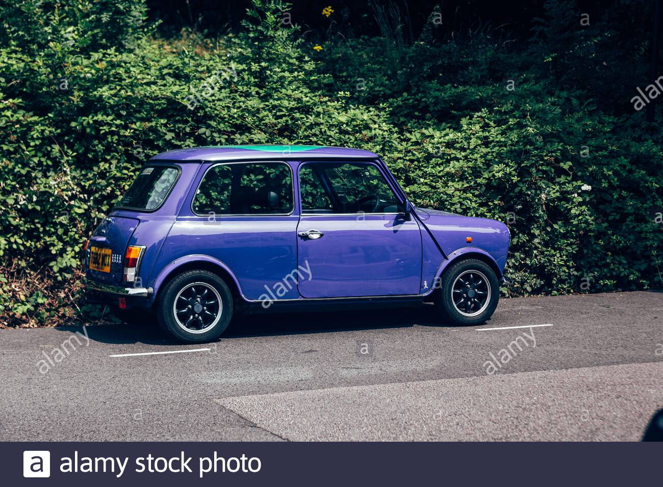 purple mini car high resolution stock photography and images alamy https www alamy com londonuk 17072019 purple mini parked on a side of the road the original is considered an icon of the 1960s british popular culture was voted t image341505048 html