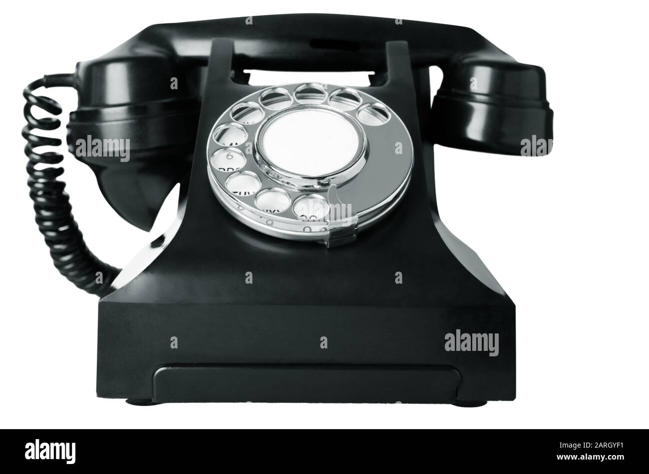 An old British bakelite telephone circa 1940s, isolated on a white background. Black and white image (greyscale). Stock Photo