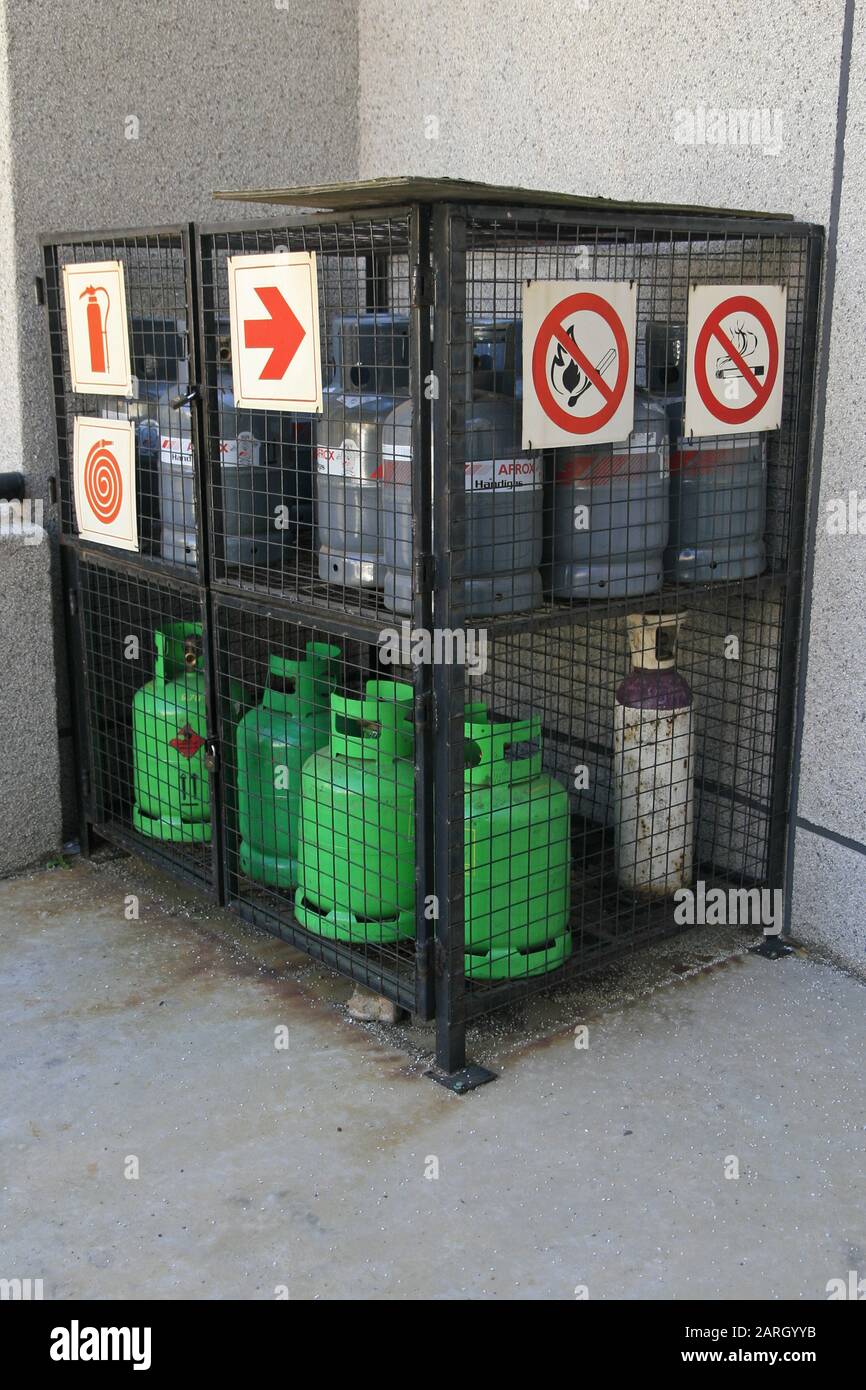 Gas bottles in cage with no smoking, no matches and fire extinguisher signs, Braamfontein